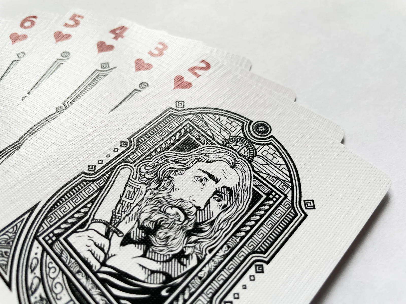 Close view of the illustrated Two of Hearts card.