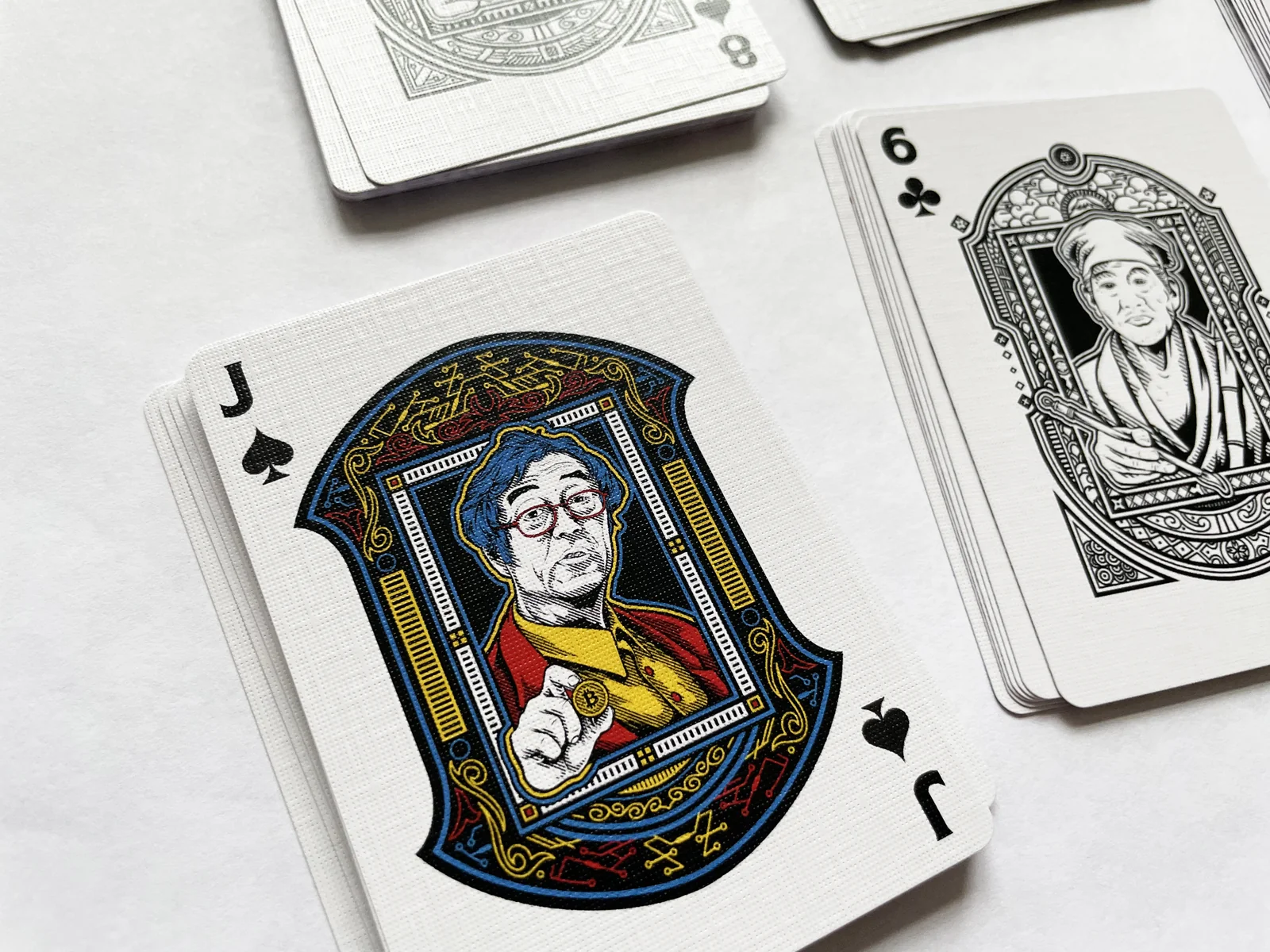Close view of the illustrated Jack of Spades card.