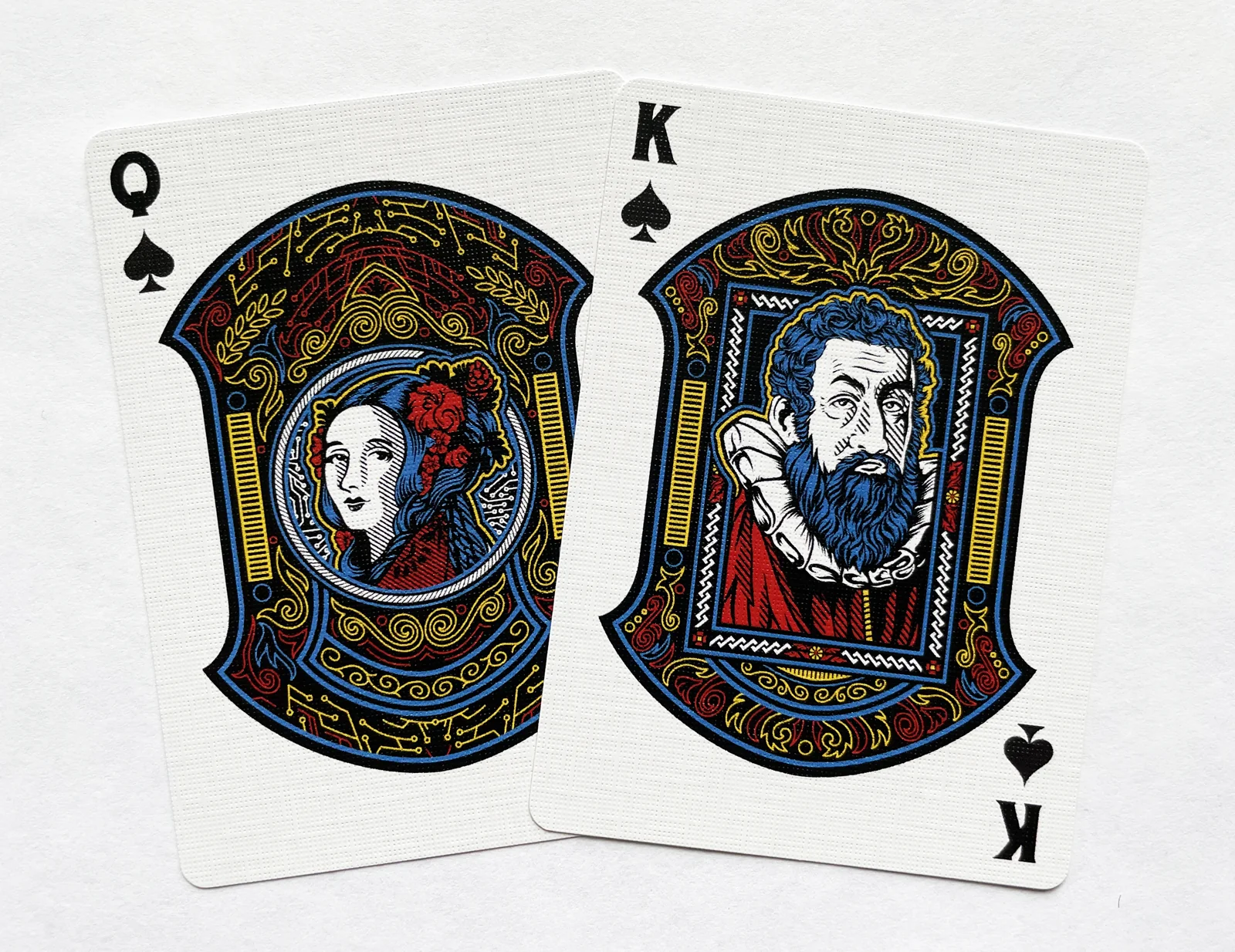 King and Queen of Spades illustrated playing cards.